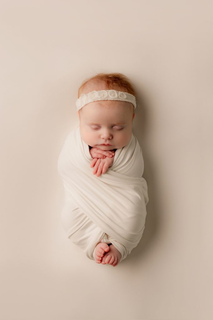 Beautiful white headband and wrap for a redheaded Everly.