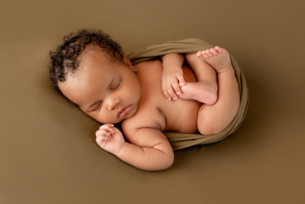 newborn boy in newborn photography session